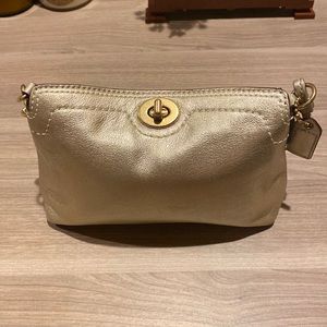 Coach gold wristlet